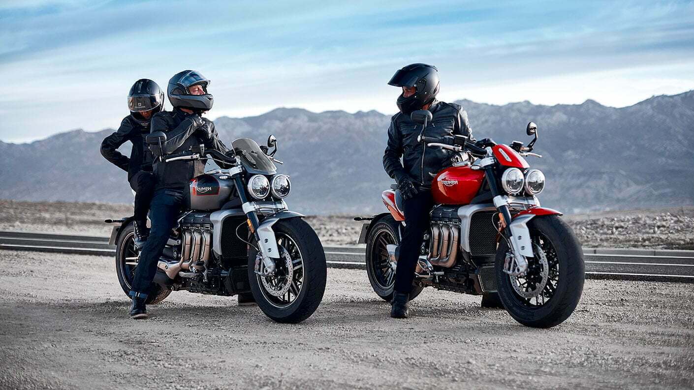 Off road riding shot of a Triumph Tiger 900 Rally Pro kicking up a cloud of dust